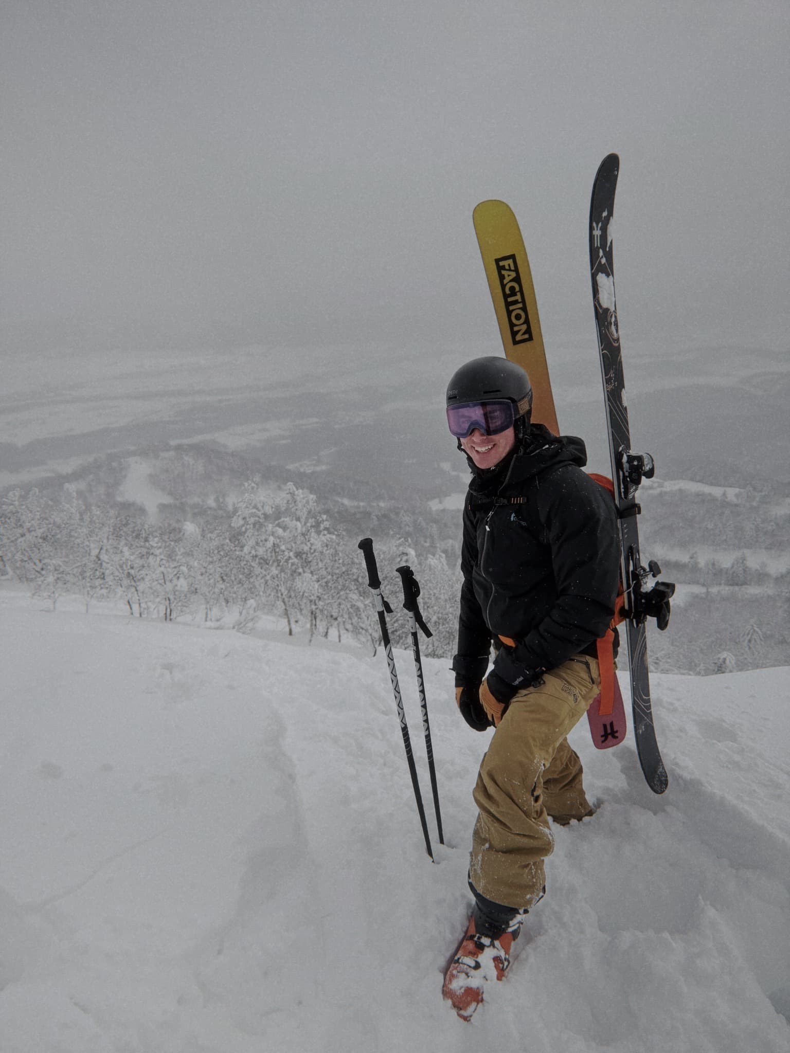 A skier standing in deep snow