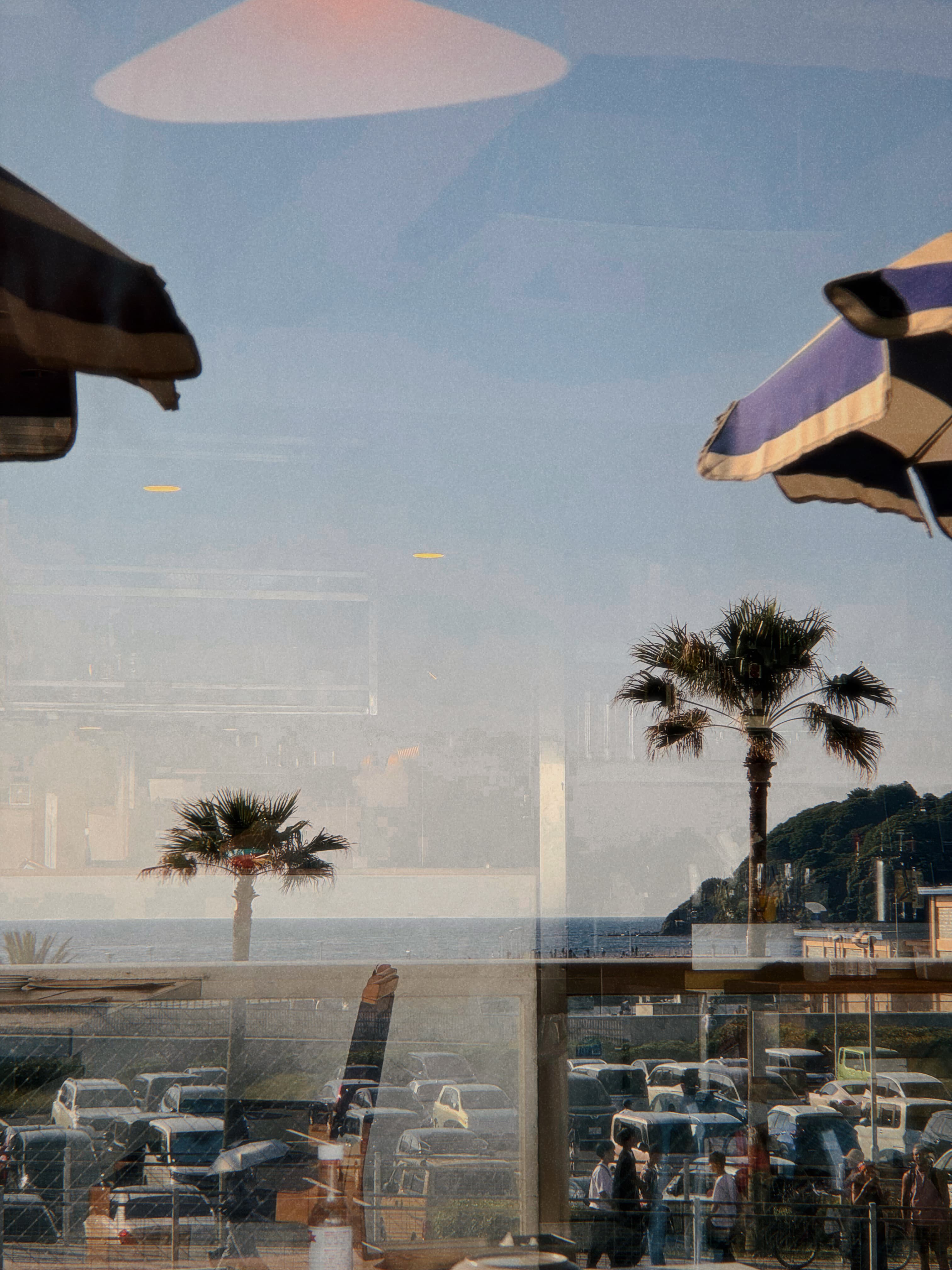A seaside cafe window reflection