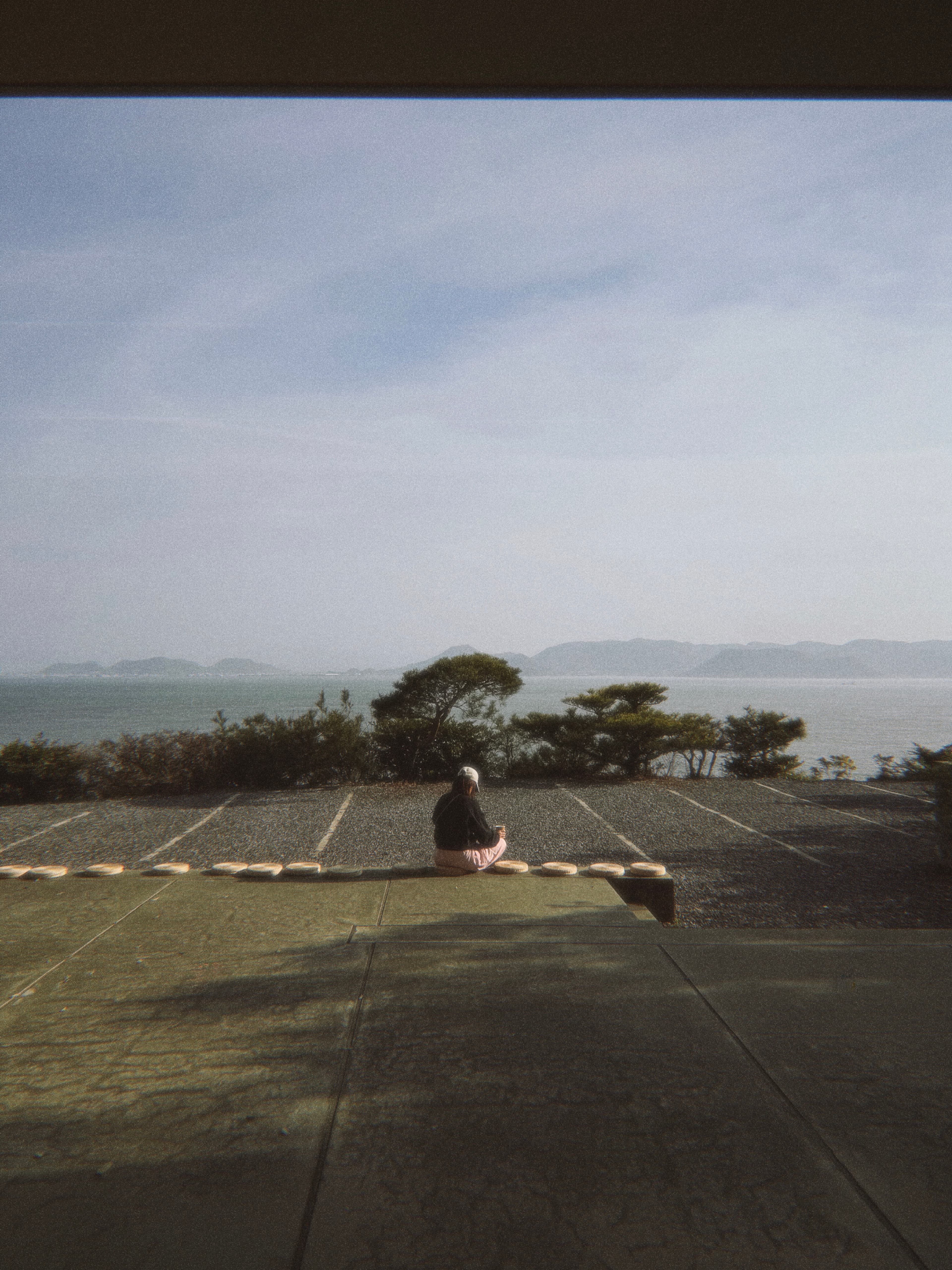 A person sitting by the Seto Inland Sea